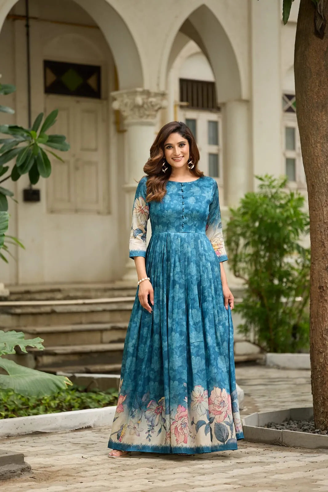 Graceful Background Floral Printed Trendy Gown - Firozi